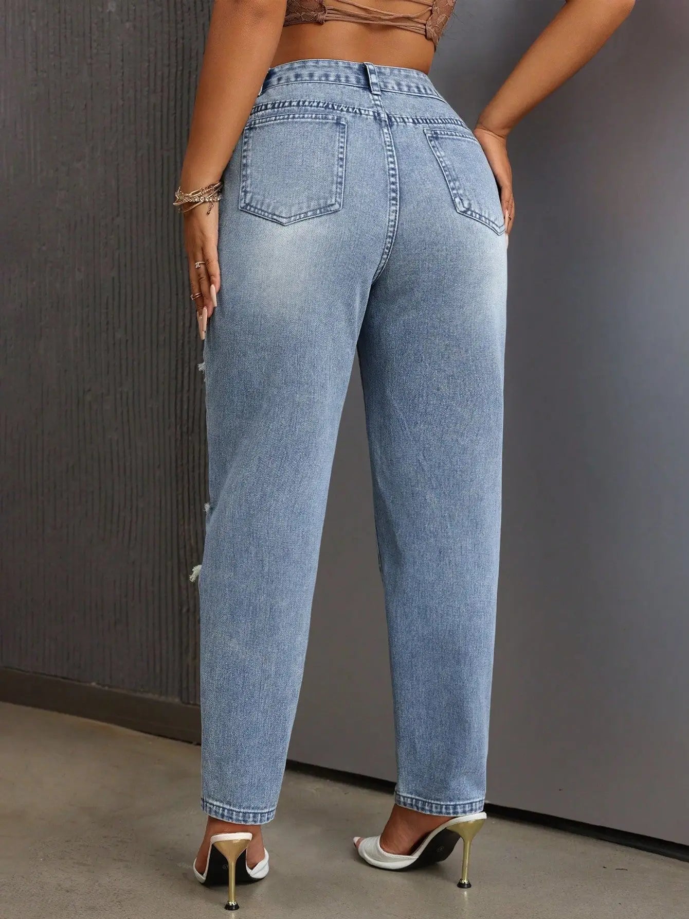 Mode européenne et américaine, jeans délavés et déchirés polyvalents et décontractés, nouveaux pantalons femme printemps-été à jambes étroites. Jeans 9 pouces