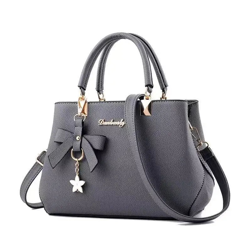 Nouvelle version coréenne tendance automne-hiver, sac pour femme avec nœud, sac portable à bandoulière, sac messager, sac « killer », sac pour maman, grande capacité