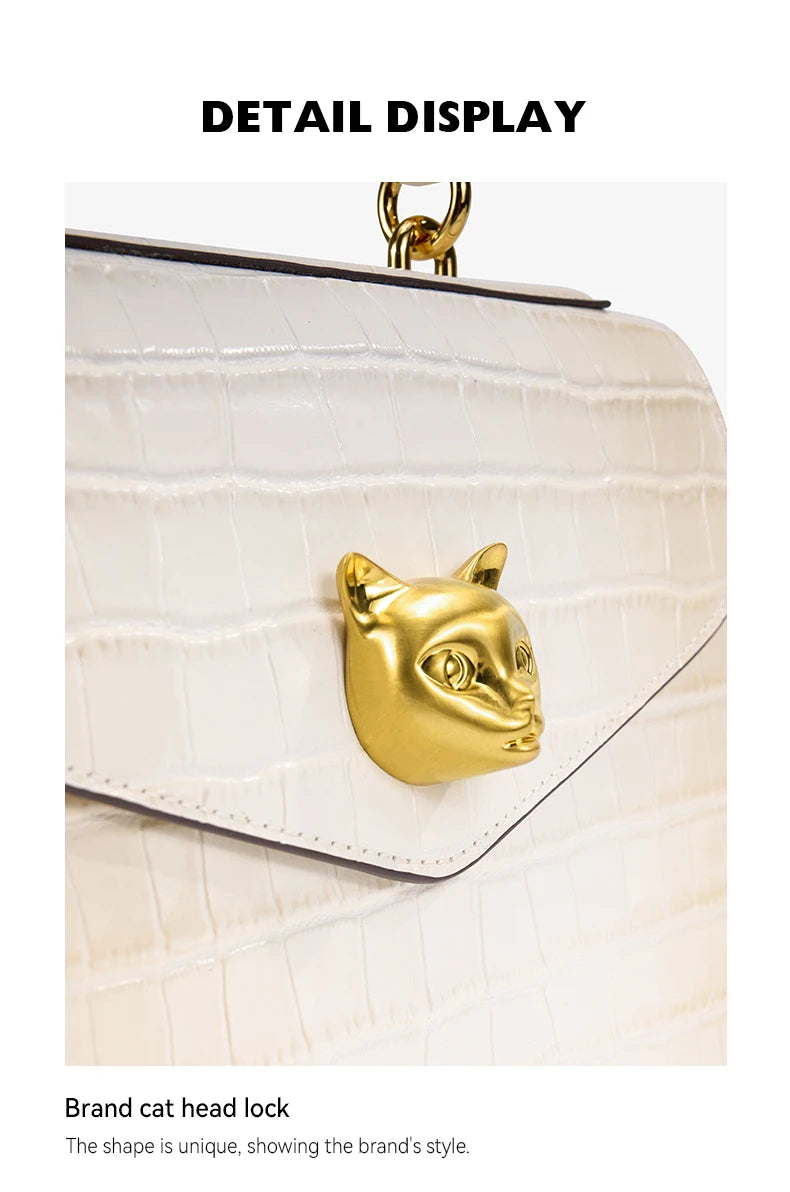 Le sac à main en cuir véritable BAFELLI au motif crocodile tendance est doté d’une bandoulière amovible en cuir de vache, adaptée au port à la main.