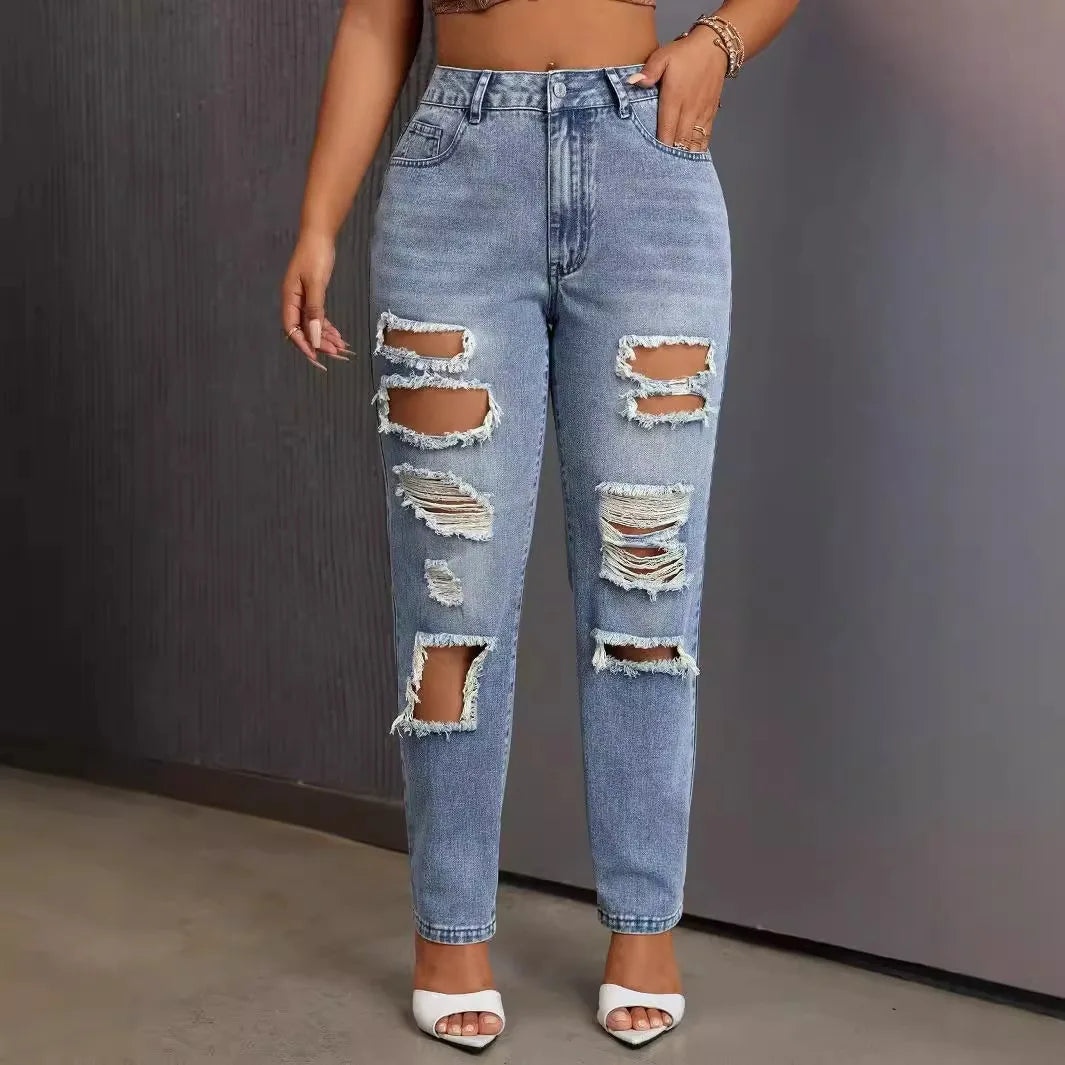 Mode européenne et américaine, jeans délavés et déchirés polyvalents et décontractés, nouveaux pantalons femme printemps-été à jambes étroites. Jeans 9 pouces
