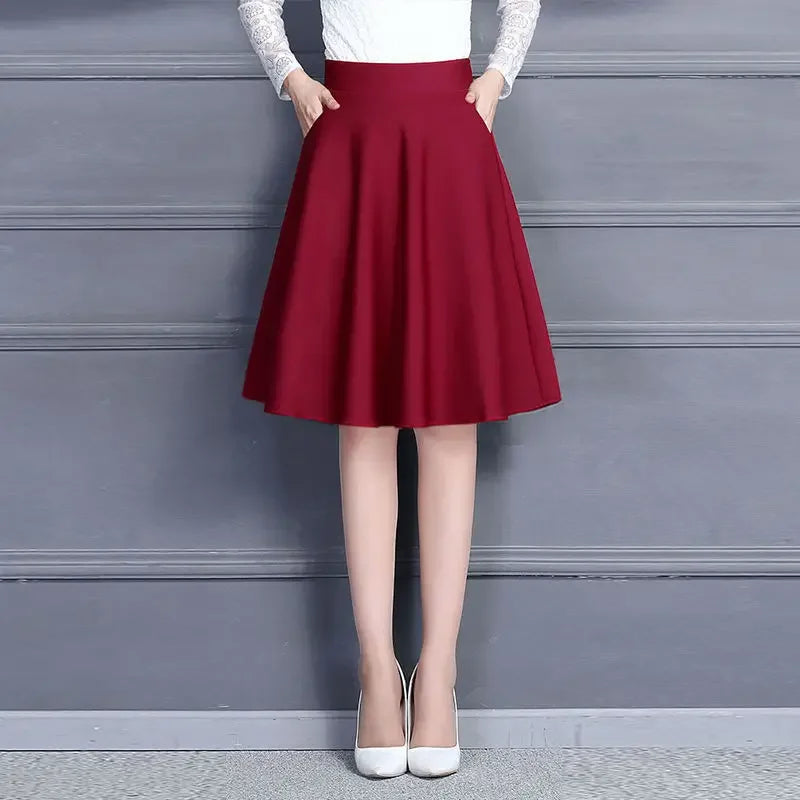 Jupes pour femmes populaires M-3XL jupe mi-longue plissée unie avec poches, taille élastique, tendance, facile à assortir, style femme de bureau, douce pour la peau, élégante