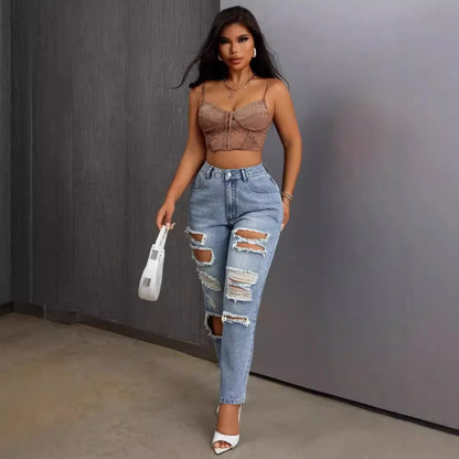 Mode européenne et américaine, jeans délavés et déchirés polyvalents et décontractés, nouveaux pantalons femme printemps-été à jambes étroites. Jeans 9 pouces